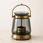 Smoked glass lantern botanical warmer with aged brass frame